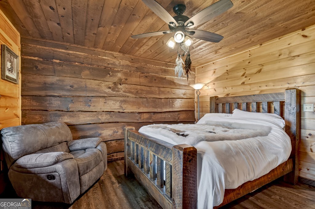 459 Quail Ridge Road Epworth, GA 30541 - Photo 67 of 73 a bedroom with a bed next to a window