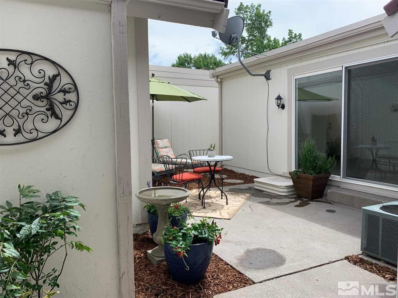 1216 Laredo Court Reno, NV 89503 - Photo 12 of 28 a view of a porch with furniture and garden