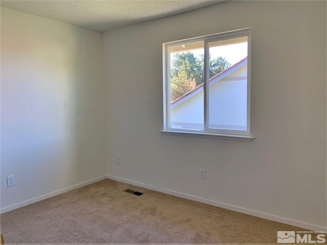1216 Laredo Court Reno, NV 89503 - Photo 18 of 28 an empty room with a window