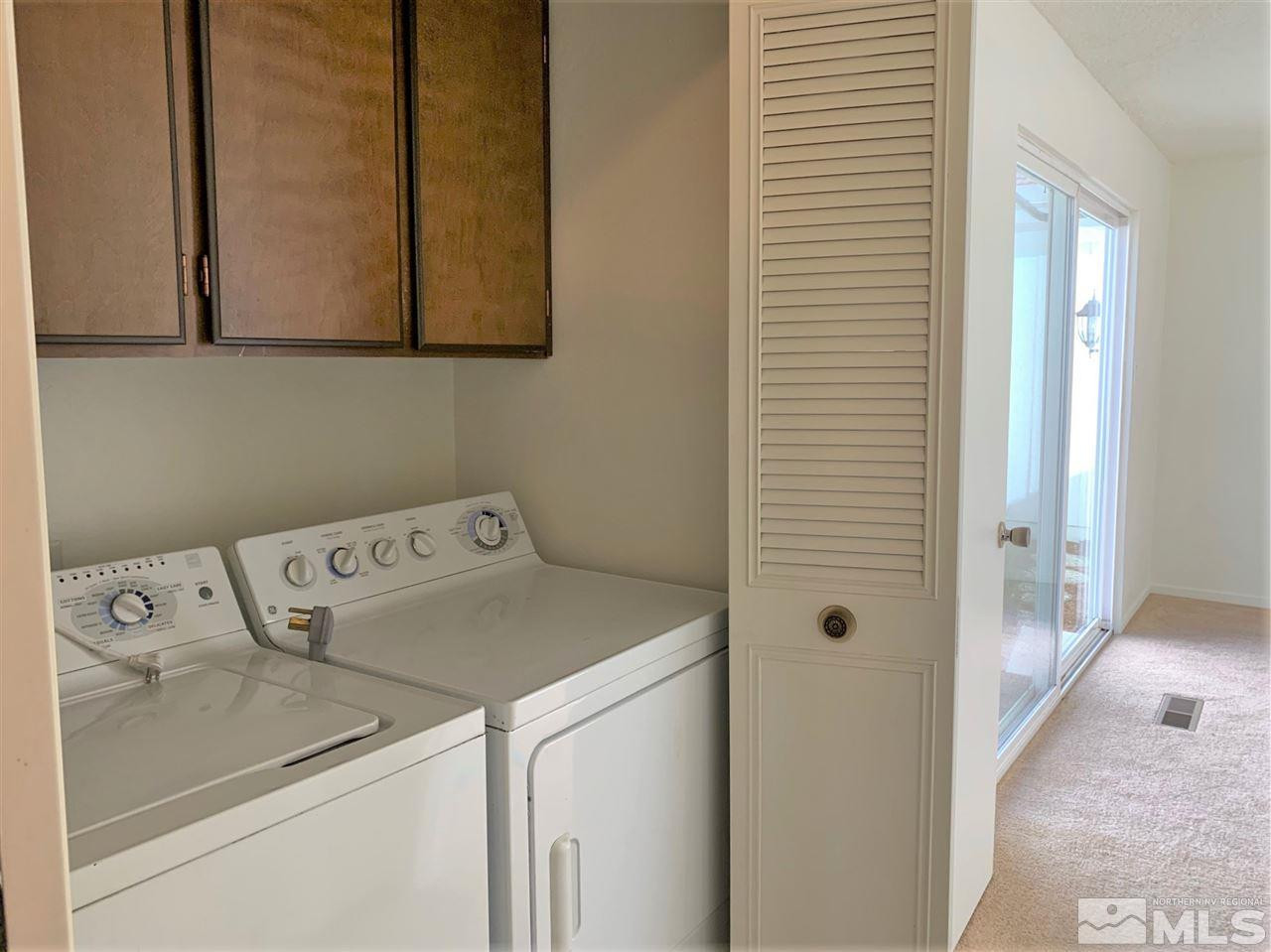 1216 Laredo Court Reno, NV 89503 - Photo 22 of 28 a utility room with dryer and washer