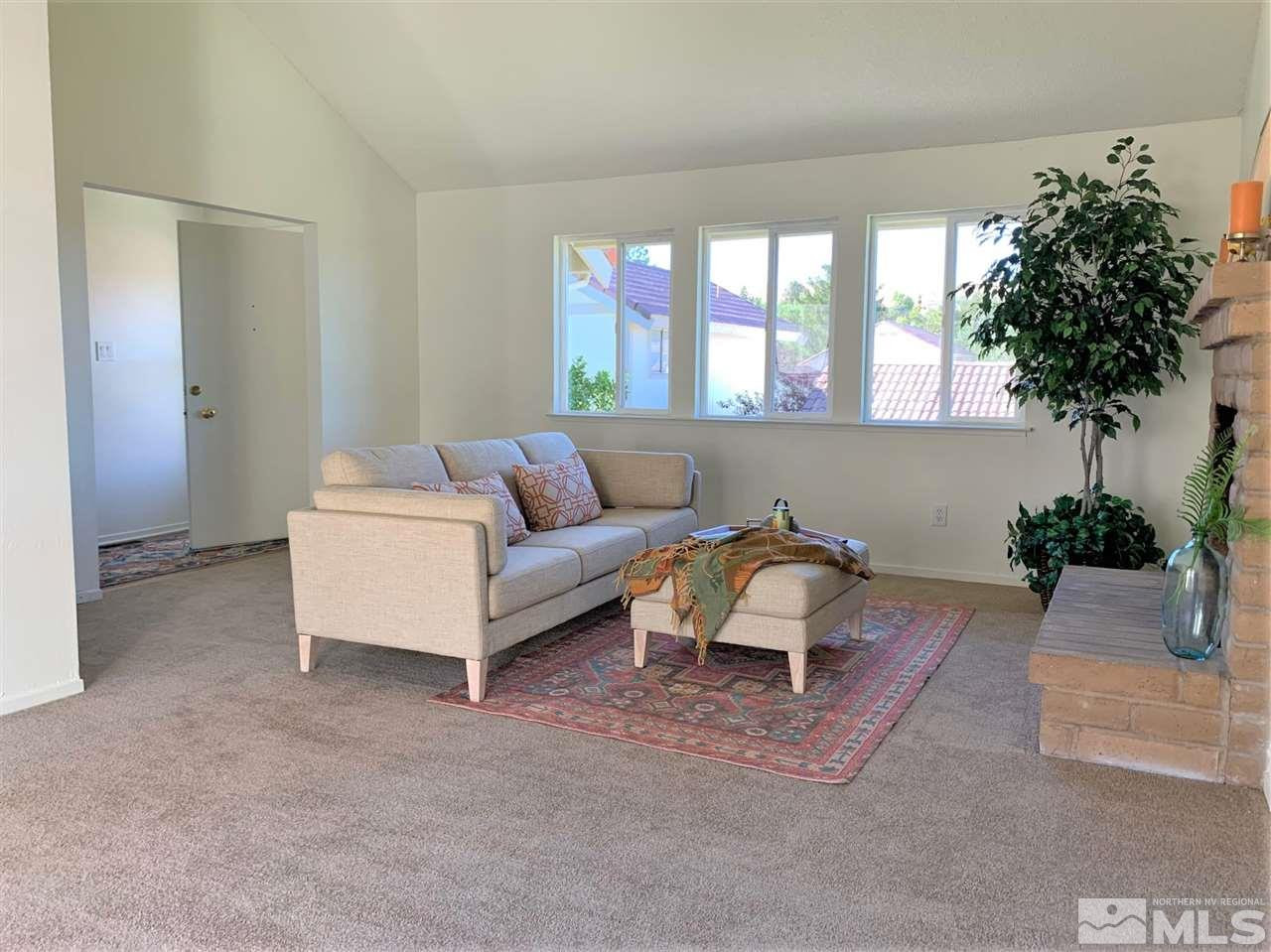 1216 Laredo Court Reno, NV 89503 - Photo 5 of 28 a living room with furniture and a potted plant