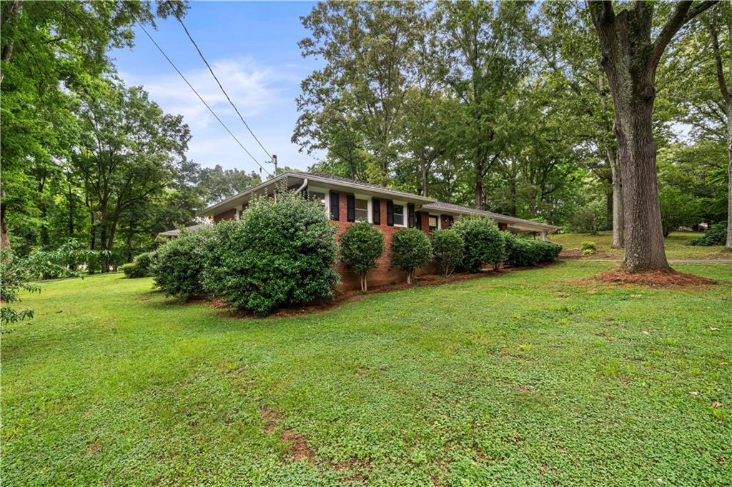 23 East Camelia Road Northeast Rome, GA 30161 - Photo 21 of 27 a view of backyard with green space