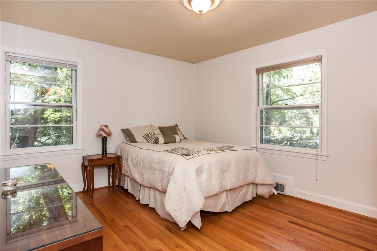 2845 Oberry Street Raleigh, NC 27607 - Photo 14 of 25 The master bedroom includes a private bath with updated tile & walk-in closet. Master Bedroom