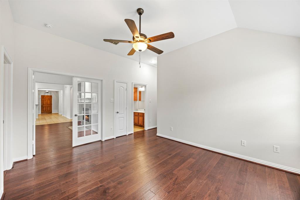 2804 Barco Grand Prairie, TX 75054 - Photo 17 of 25 a view of empty room with wooden floor