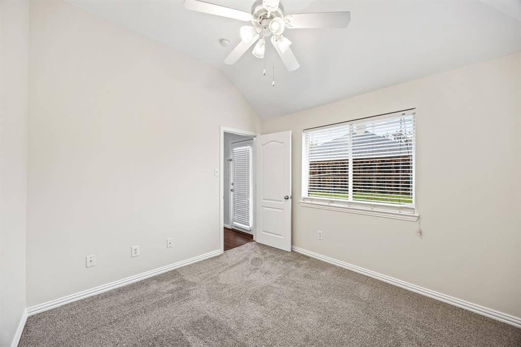 2804 Barco Grand Prairie, TX 75054 - Photo 21 of 25 a view of an empty room with a window