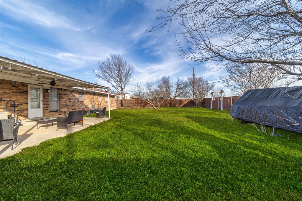 10 Carter Road Van Alstyne, TX 75495 - Photo 34 of 37 a view of yard with swimming pool and sitting area