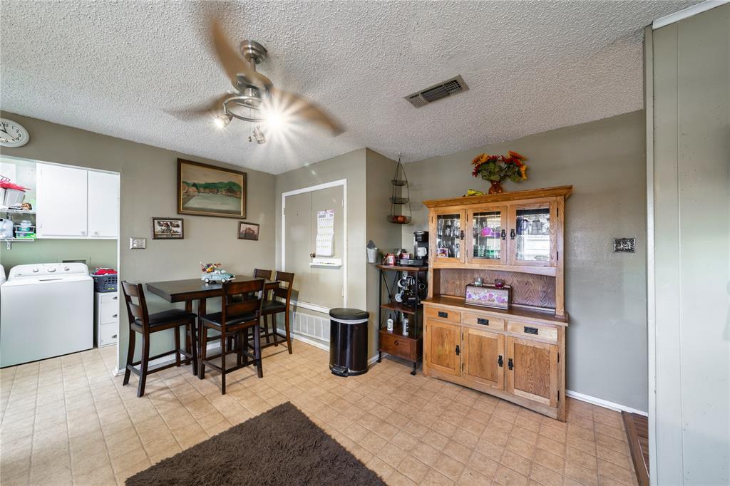 10 Carter Road Van Alstyne, TX 75495 - Photo 9 of 37 a view of a livingroom and a dining room with furniture and chandelier fan