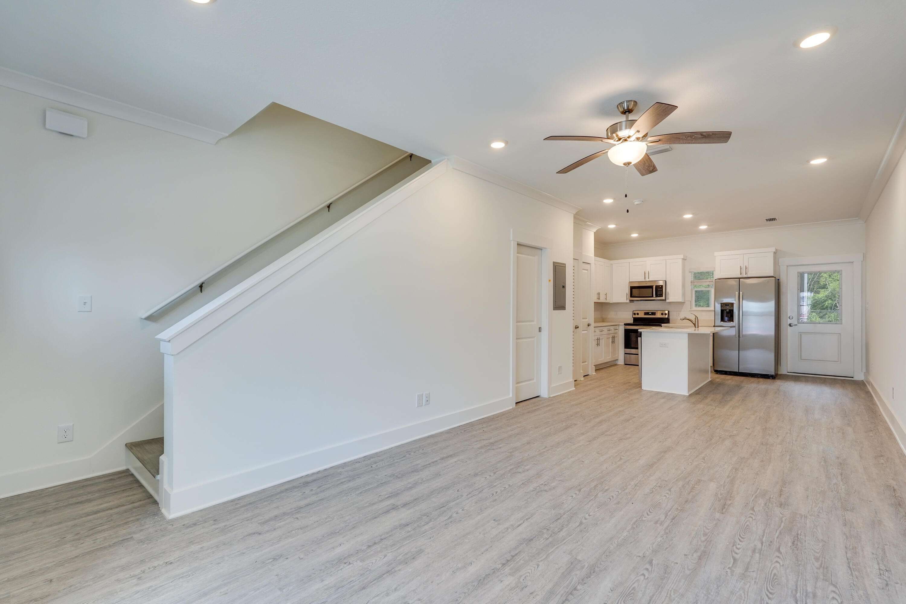 16 Date Palm Lane Freeport, FL 32439 - Photo 3 of 10 a view of a kitchen with wooden floor and a kitchen
