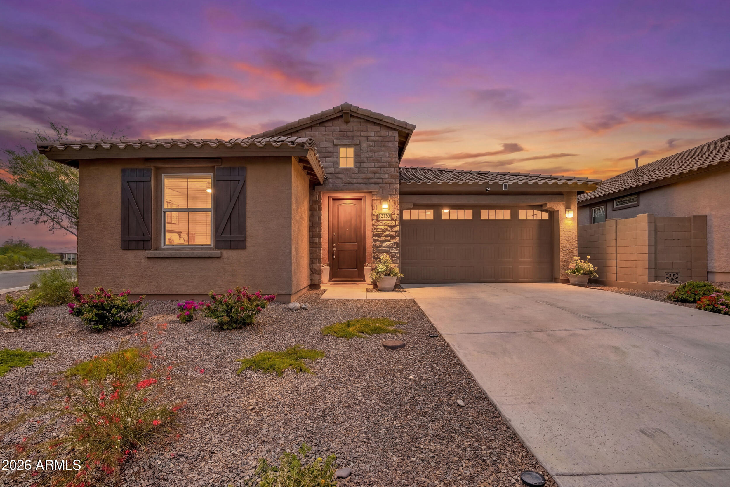 12330 East Soloman Road Gold Canyon, AZ 85118 - Photo 1 of 69 a front view of a house with a yard and garage