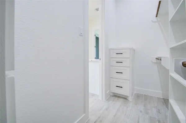 a view of a walk in closet