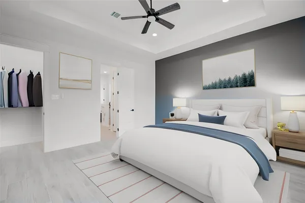 a bedroom with a bed and a painting on the wall