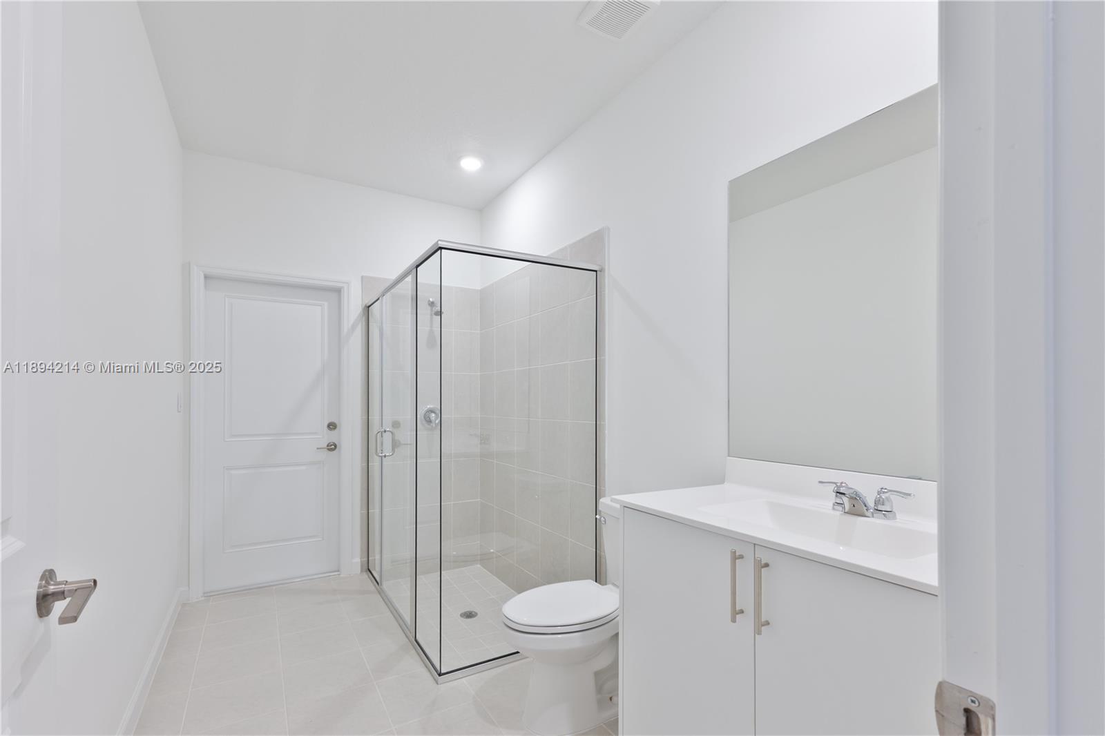 13203 Southwest 188th Terrace, Unit 13203 Miami, FL 33177 - Photo 14 of 49 a bathroom with a sink a toilet and shower