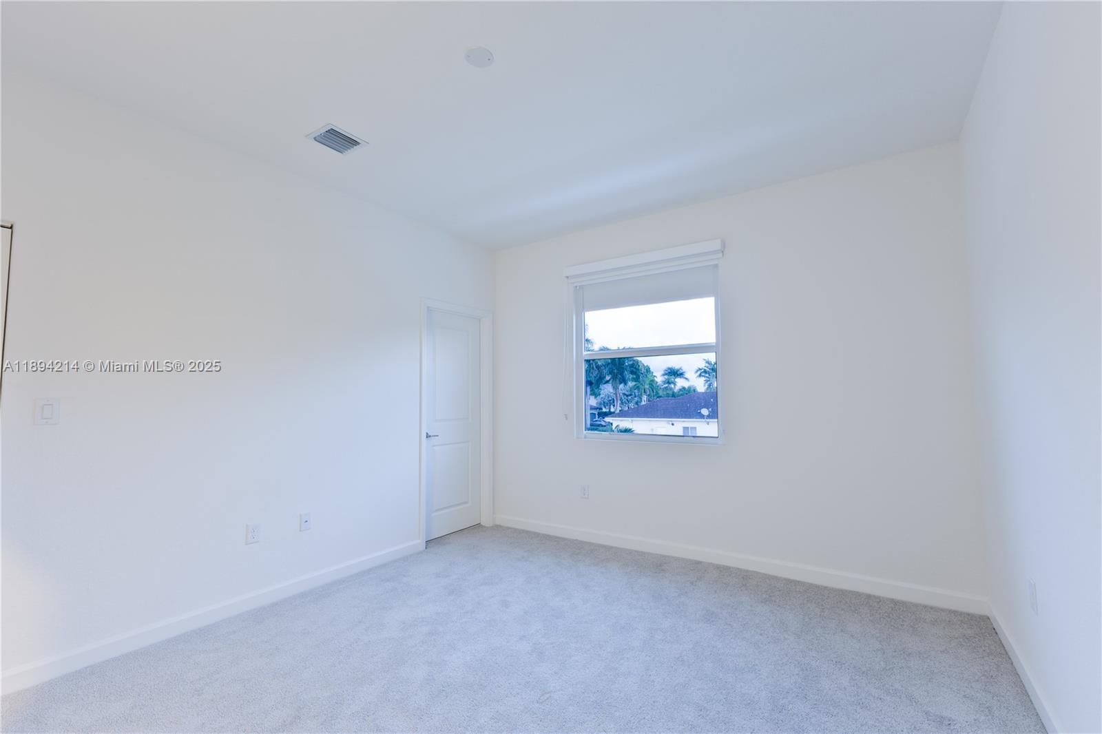 13203 Southwest 188th Terrace, Unit 13203 Miami, FL 33177 - Photo 34 of 49 an empty room with windows