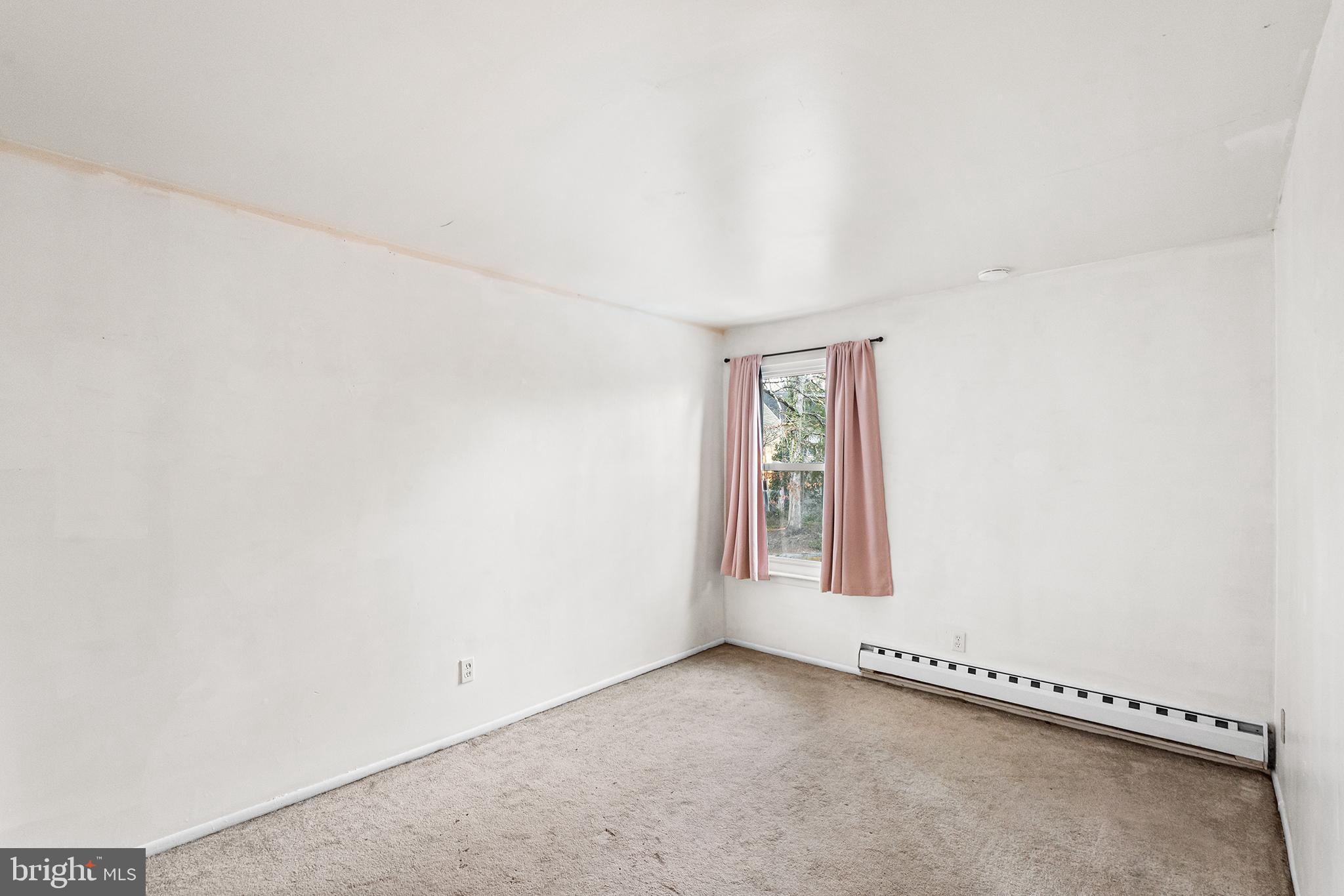 302 Bromley Estate Pine Hill, NJ 08021 - Photo 25 of 29 an empty room with windows
