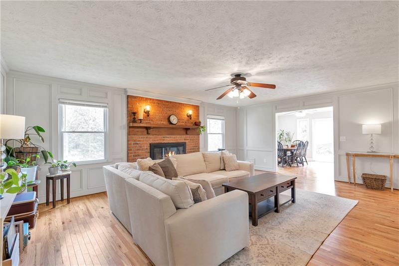 3167 Northbrook Drive Atlanta, GA 30341 - Photo 16 of 41 a living room with furniture and a fireplace