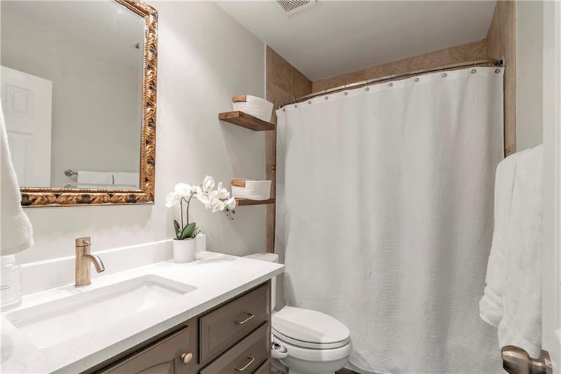 3167 Northbrook Drive Atlanta, GA 30341 - Photo 35 of 41 a bathroom with a granite countertop sink and a mirror