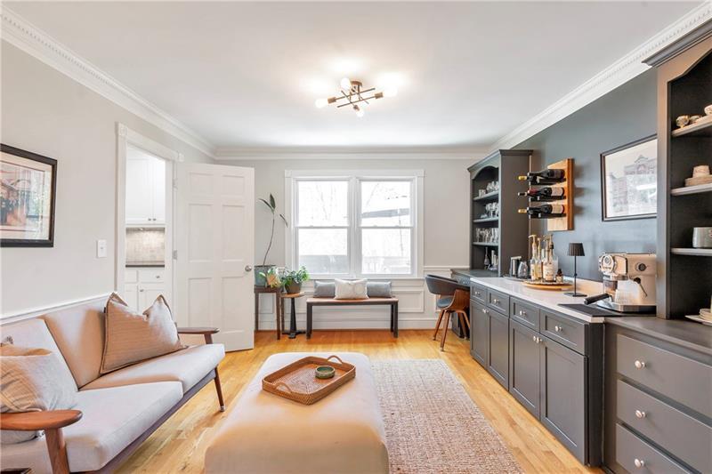 3167 Northbrook Drive Atlanta, GA 30341 - Photo 6 of 41 a living room with furniture a large window and a chandelier