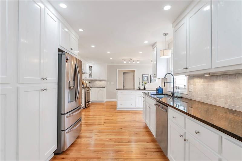 3167 Northbrook Drive Atlanta, GA 30341 - Photo 10 of 41 a large kitchen with stainless steel appliances lots of counter top space and cabinets