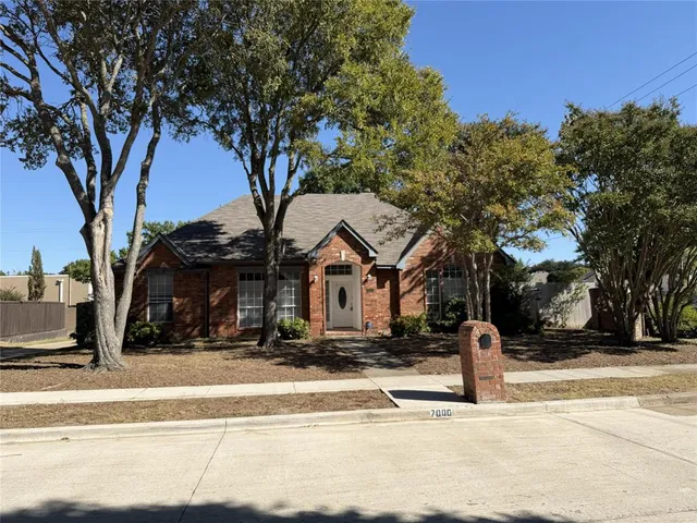 a view of a building with trees
