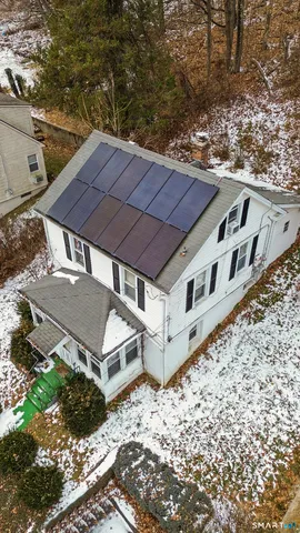 a large white building with a large window