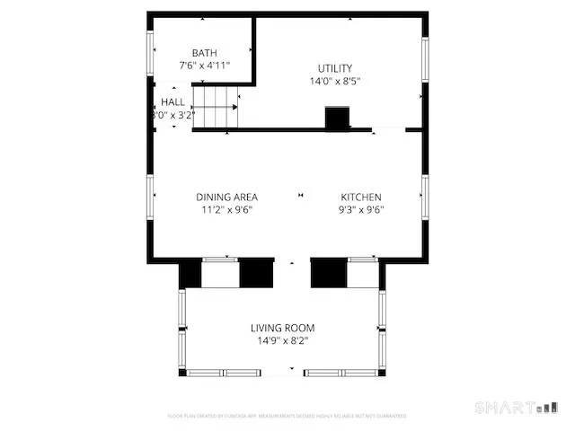 a picture of a building with a white fence