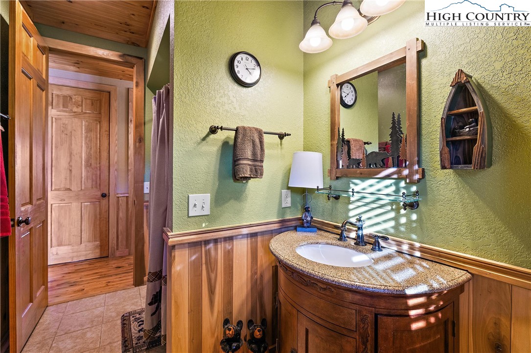52 Hackett Gragg Road Newland, NC 28657 - Photo 29 of 41 a bathroom with a sink double vanity and a mirror