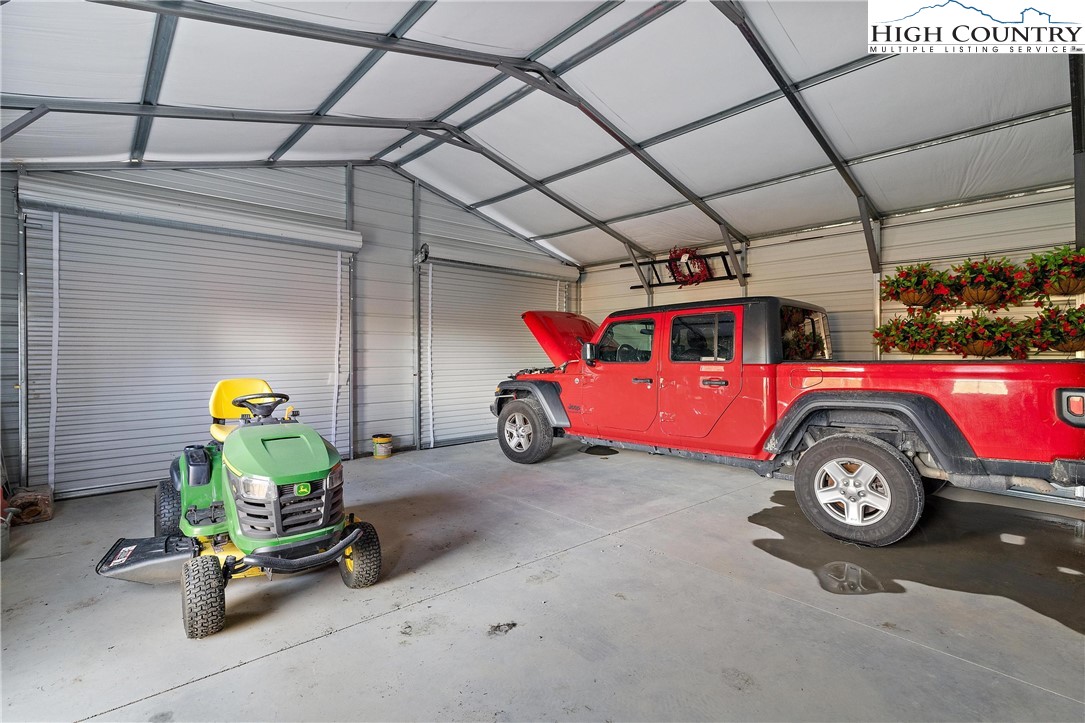 52 Hackett Gragg Road Newland, NC 28657 - Photo 40 of 41 a view of a garage with cars