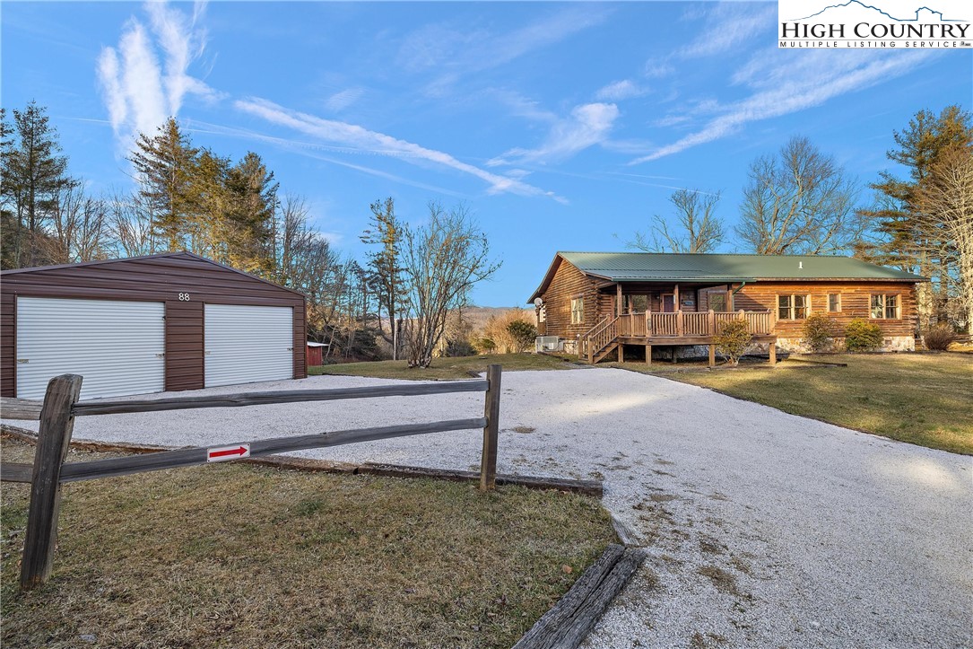 52 Hackett Gragg Road Newland, NC 28657 - Photo 41 of 41 a view of an house with backyard and road