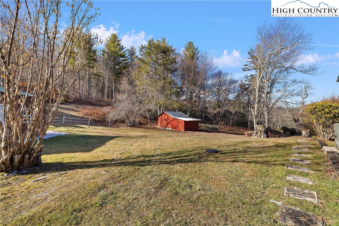 52 Hackett Gragg Road Newland, NC 28657 - Photo 5 of 41 a house with trees in front of it