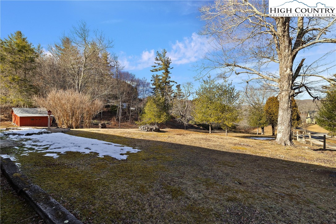 52 Hackett Gragg Road Newland, NC 28657 - Photo 6 of 41 a view of road with large trees