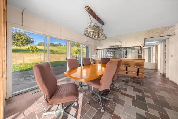 a view of livingroom with furniture and flat screen tv