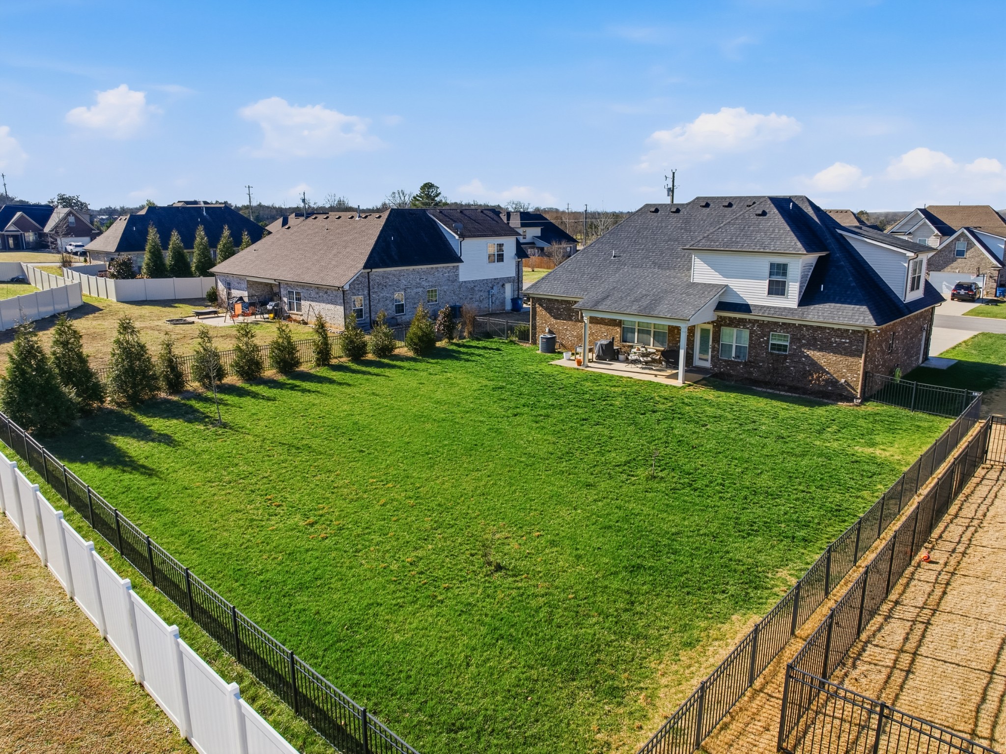 1008 Ash Ridge Road Lascassas, TN 37085 - Photo 26 of 34 a aerial view of a house with yard and deck