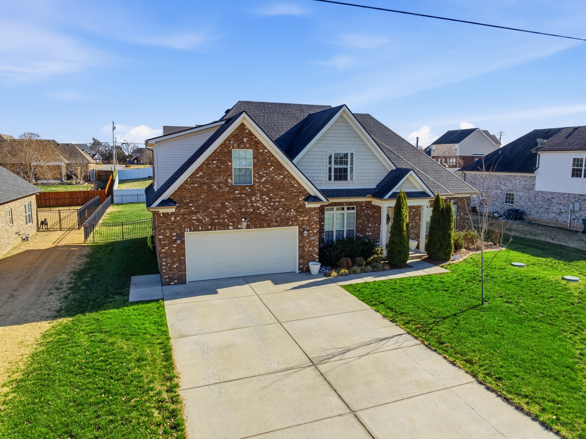 1008 Ash Ridge Road Lascassas, TN 37085 - Photo 31 of 34 a front view of a house with a yard