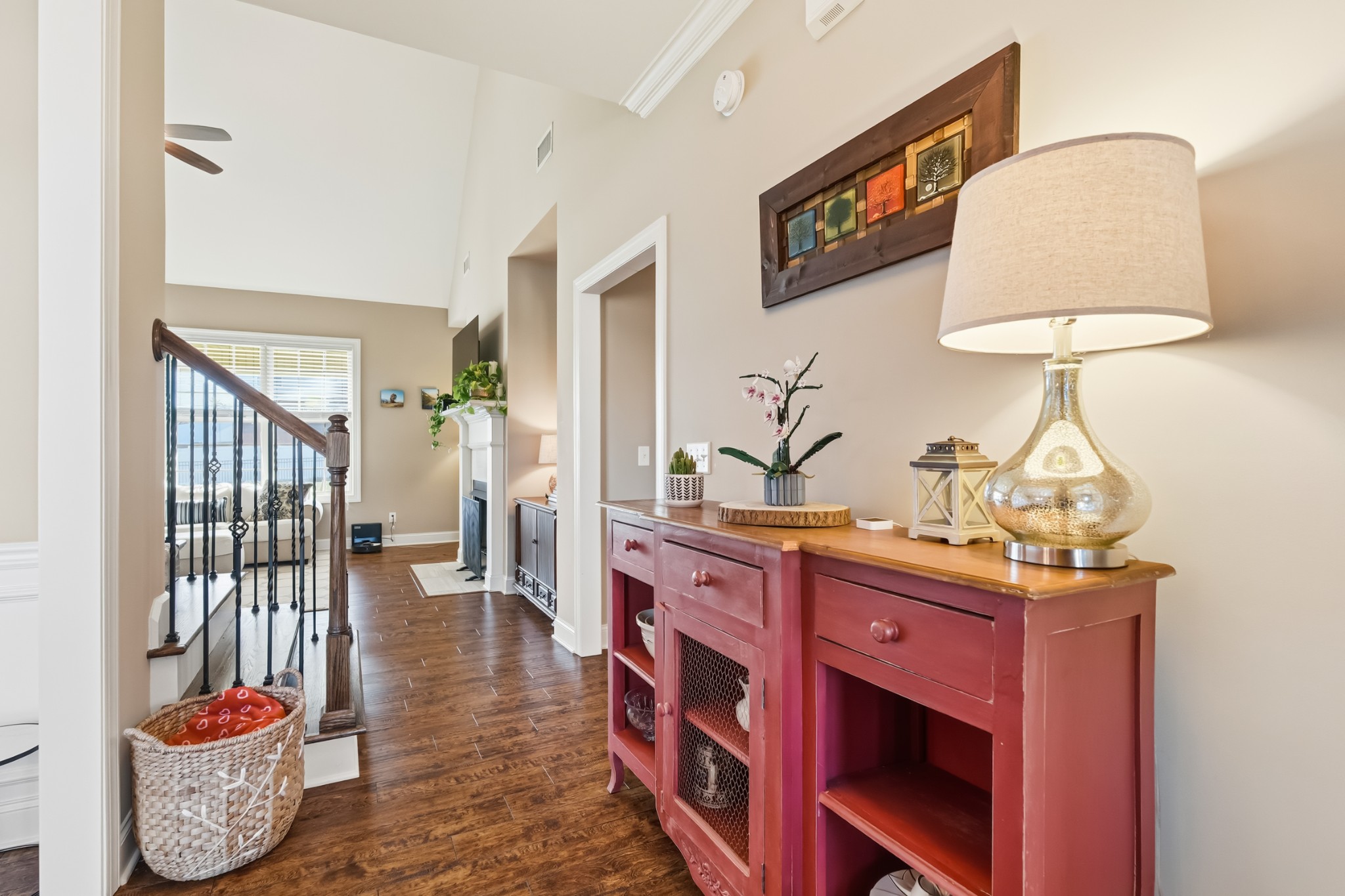 1008 Ash Ridge Road Lascassas, TN 37085 - Photo 4 of 34 a hallway with a table and a chair