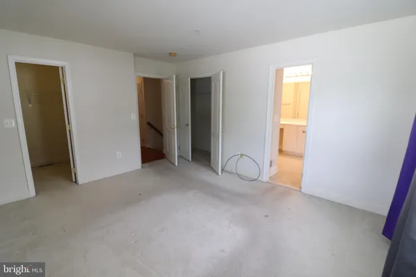 a view of a room with closet area