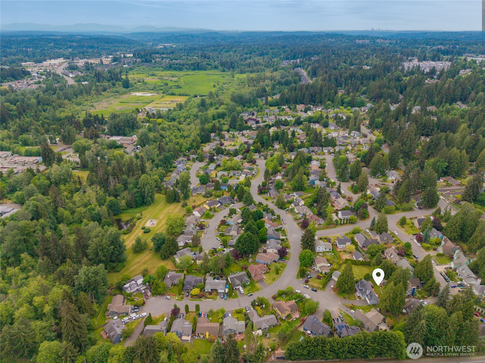 412 164th Place Southeast Bothell, WA 98012 - Photo 38 of 39 a view of a lush green hillside and houses