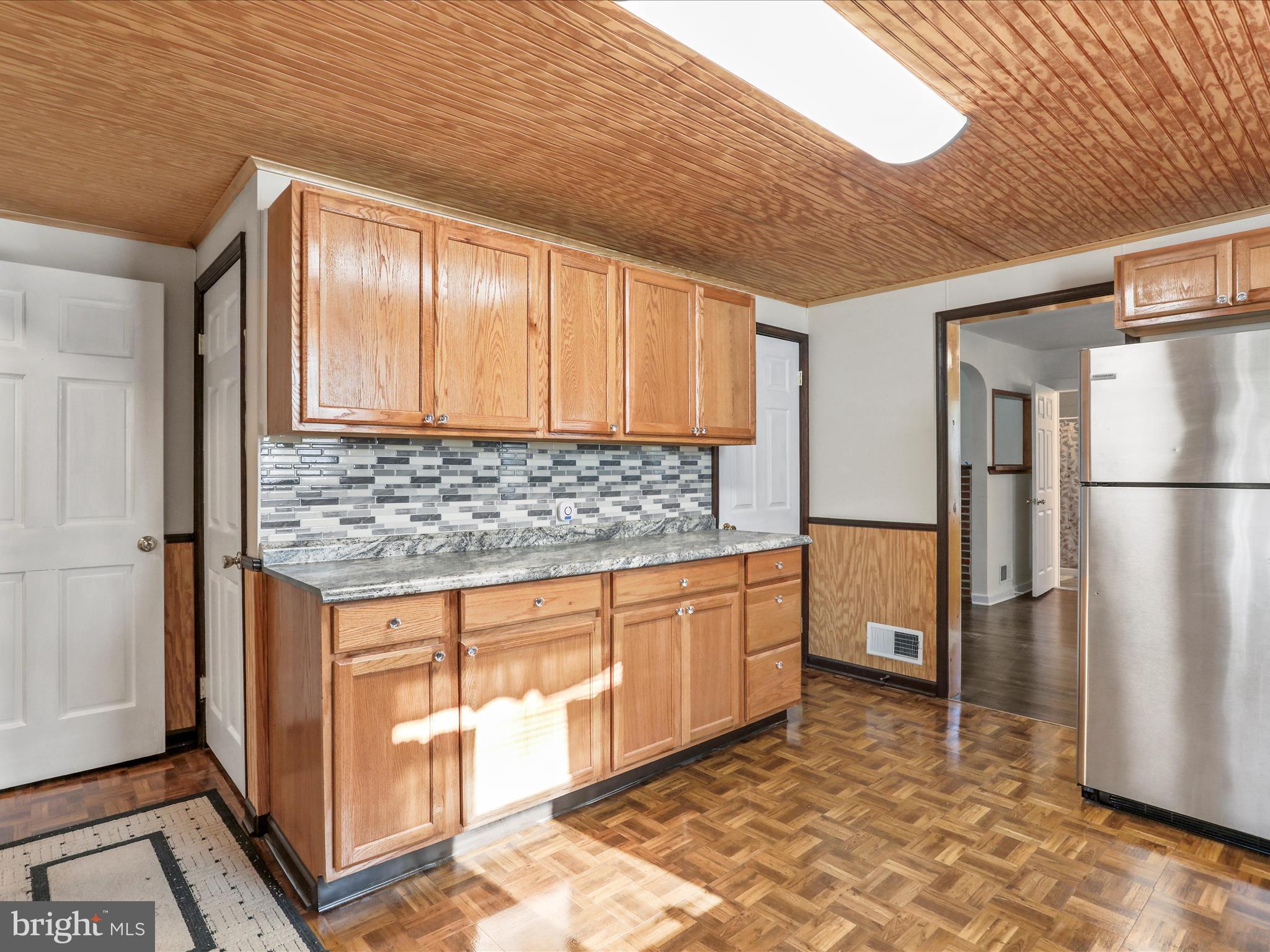 25411 Cascade Road Cascade, MD 21719 - Photo 17 of 53 a kitchen with stainless steel appliances granite countertop a refrigerator and a sink