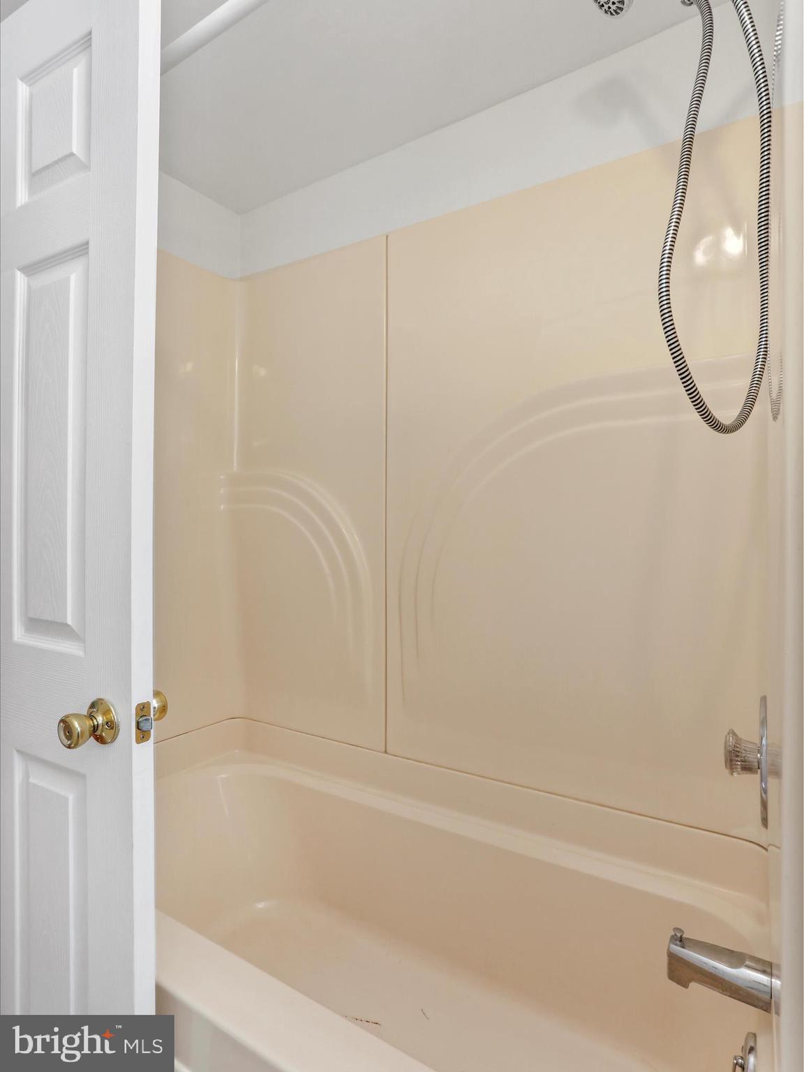 25411 Cascade Road Cascade, MD 21719 - Photo 29 of 53 a bathroom with a glass shower door