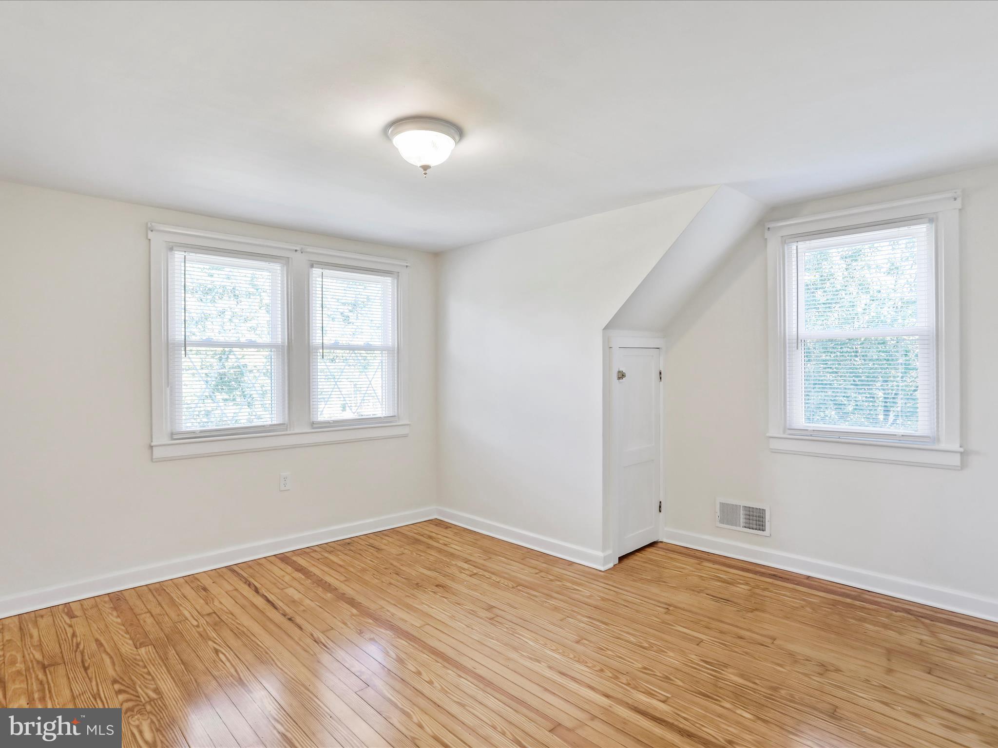 25411 Cascade Road Cascade, MD 21719 - Photo 30 of 53 a view of empty room with wooden floor and fan