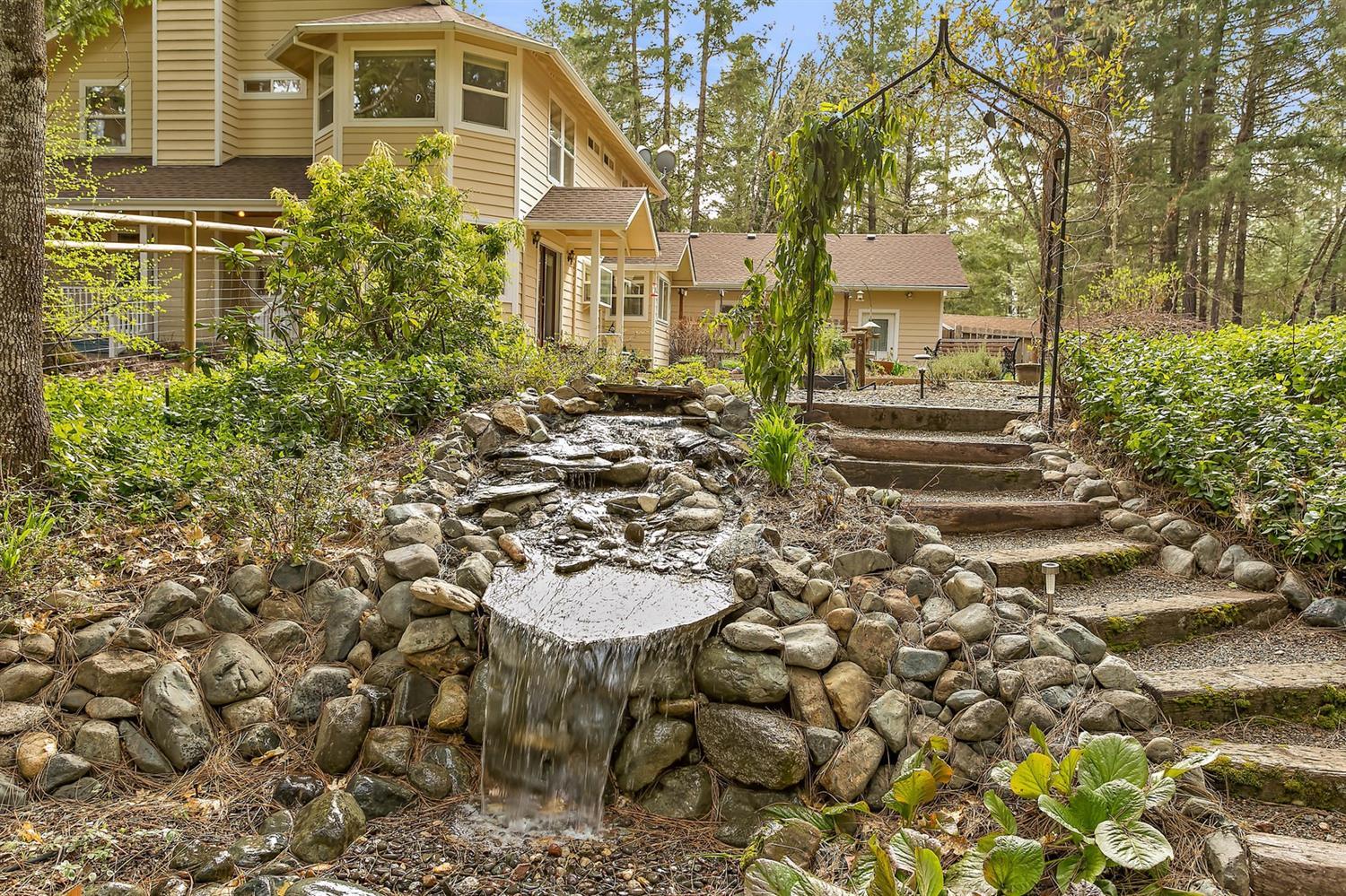 1000 Crow Road Merlin, OR 97532 - Photo 13 of 31 a front view of a house with a yard