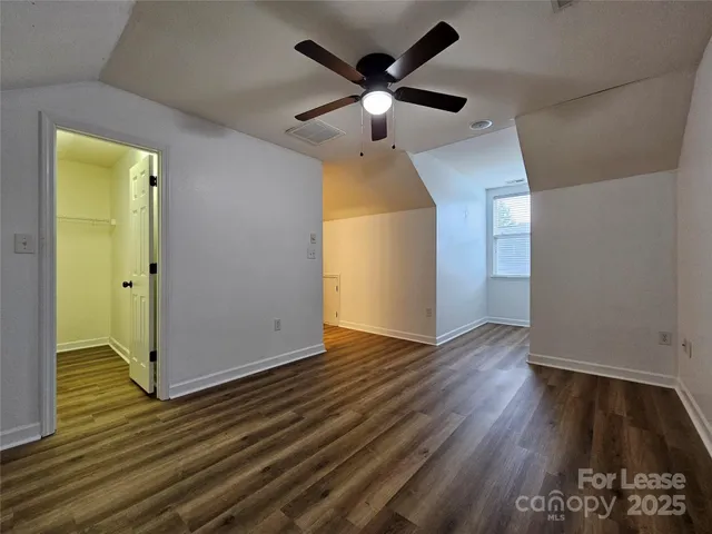 a view of a livingroom with wooden floor