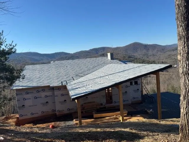 a view of a house with a mountain