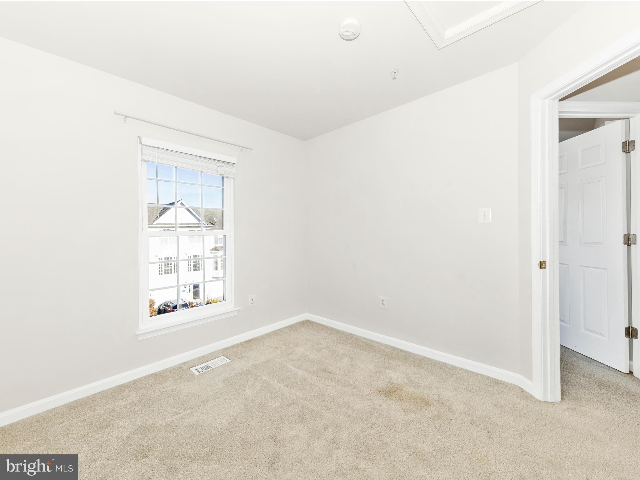 2103 Paxton Terrace Frederick, MD 21702 - Photo 32 of 51 an empty room with a window