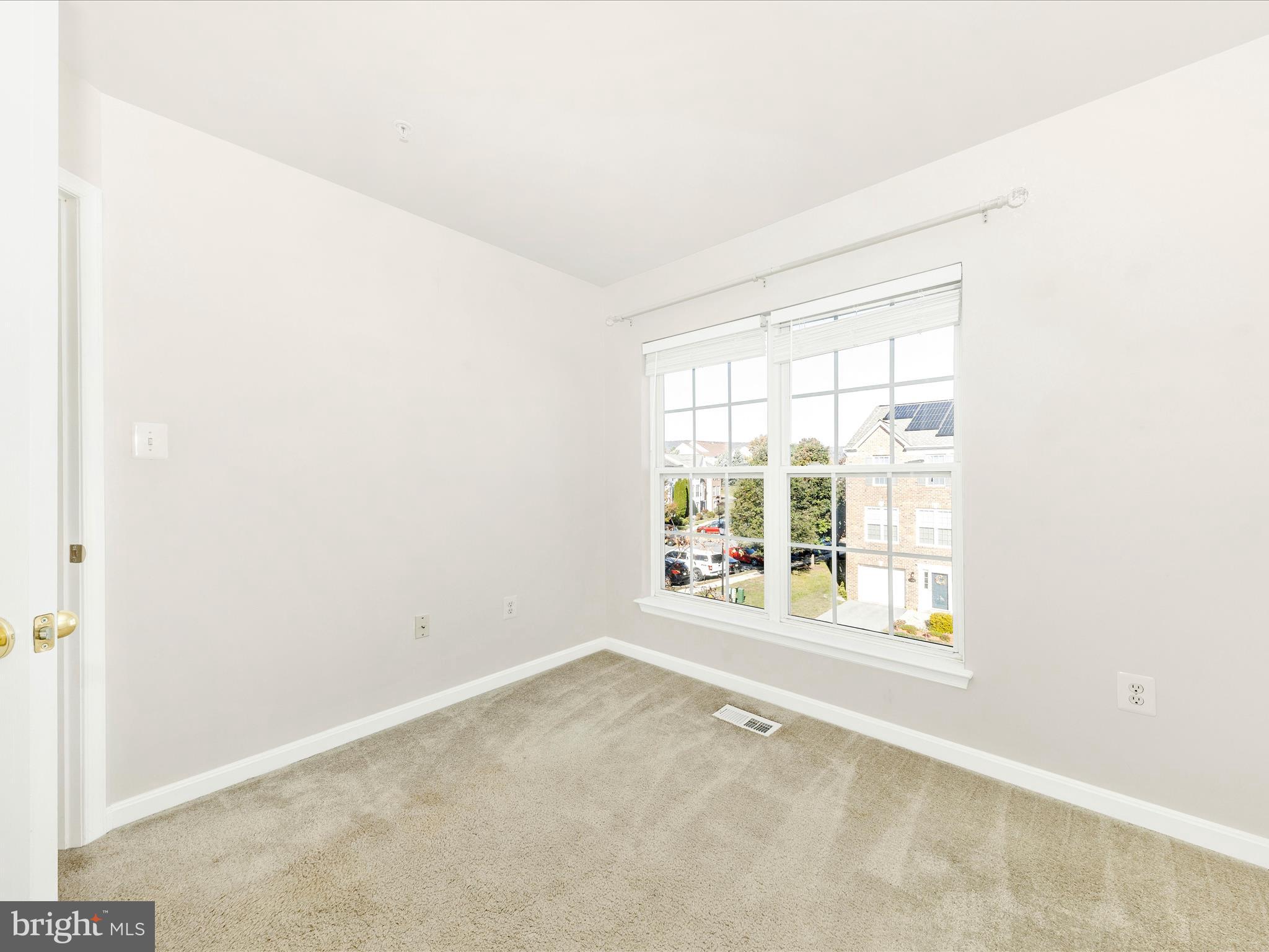 2103 Paxton Terrace Frederick, MD 21702 - Photo 36 of 51 an empty room with a window