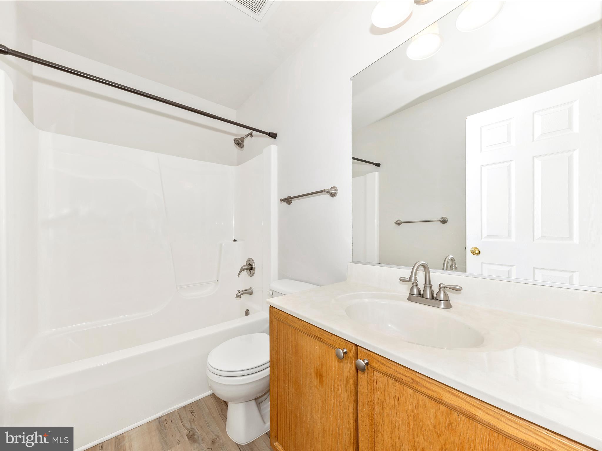 2103 Paxton Terrace Frederick, MD 21702 - Photo 39 of 51 a bathroom with a sink a toilet and a bathtub