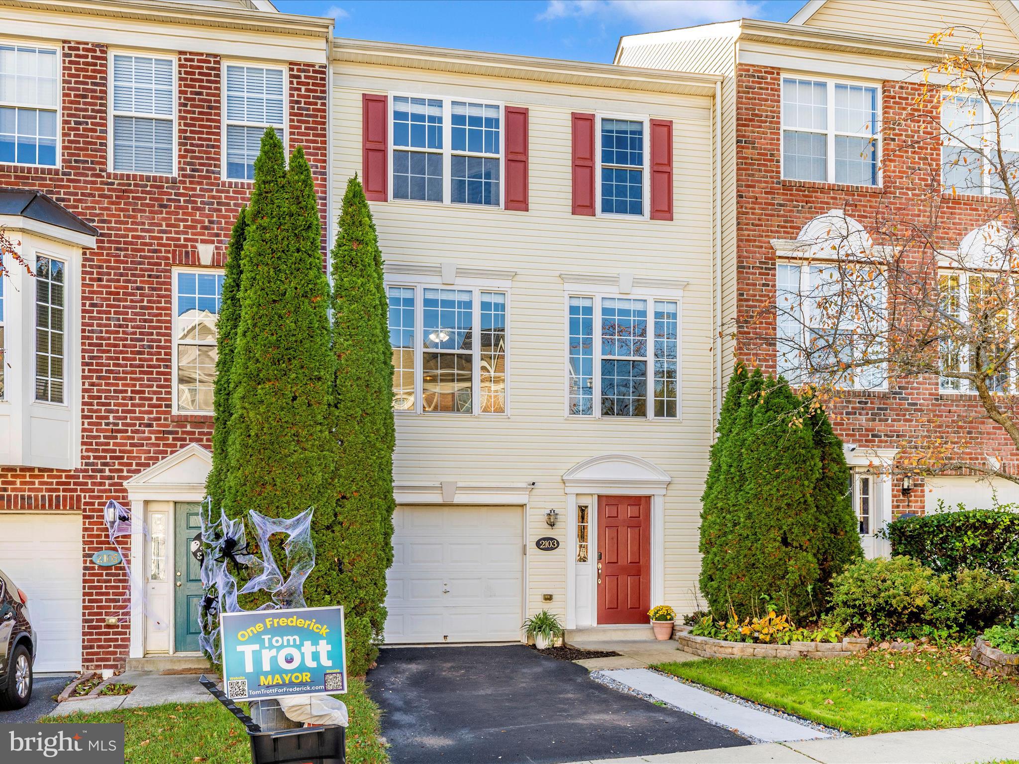 2103 Paxton Terrace Frederick, MD 21702 - Photo 40 of 51 a front view of a house with a garden