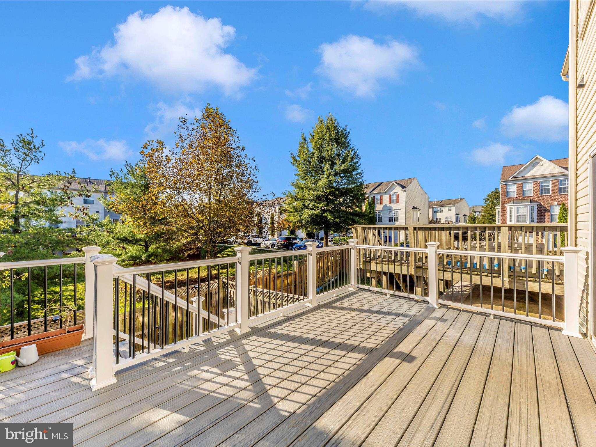 2103 Paxton Terrace Frederick, MD 21702 - Photo 50 of 51 a view of a balcony with wooden floor and city view