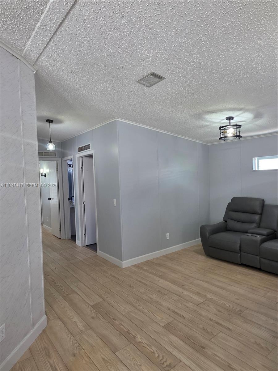 17350 Southwest 232nd Street, Unit 47 Miami, FL 33170 - Photo 2 of 9 a view of a livingroom with a couch