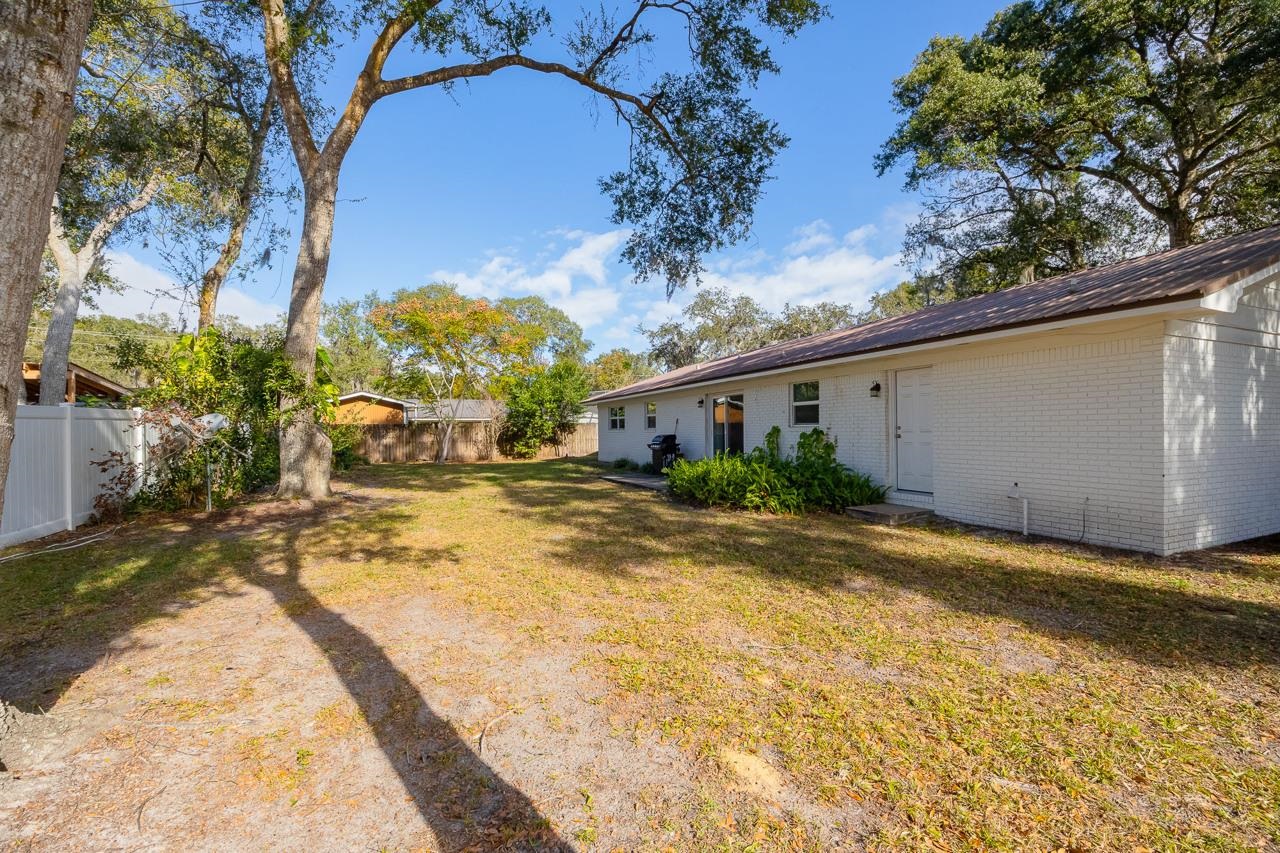 110 Queen Road St. Augustine, FL 32086 - Photo 24 of 37 a view of a house with a yard