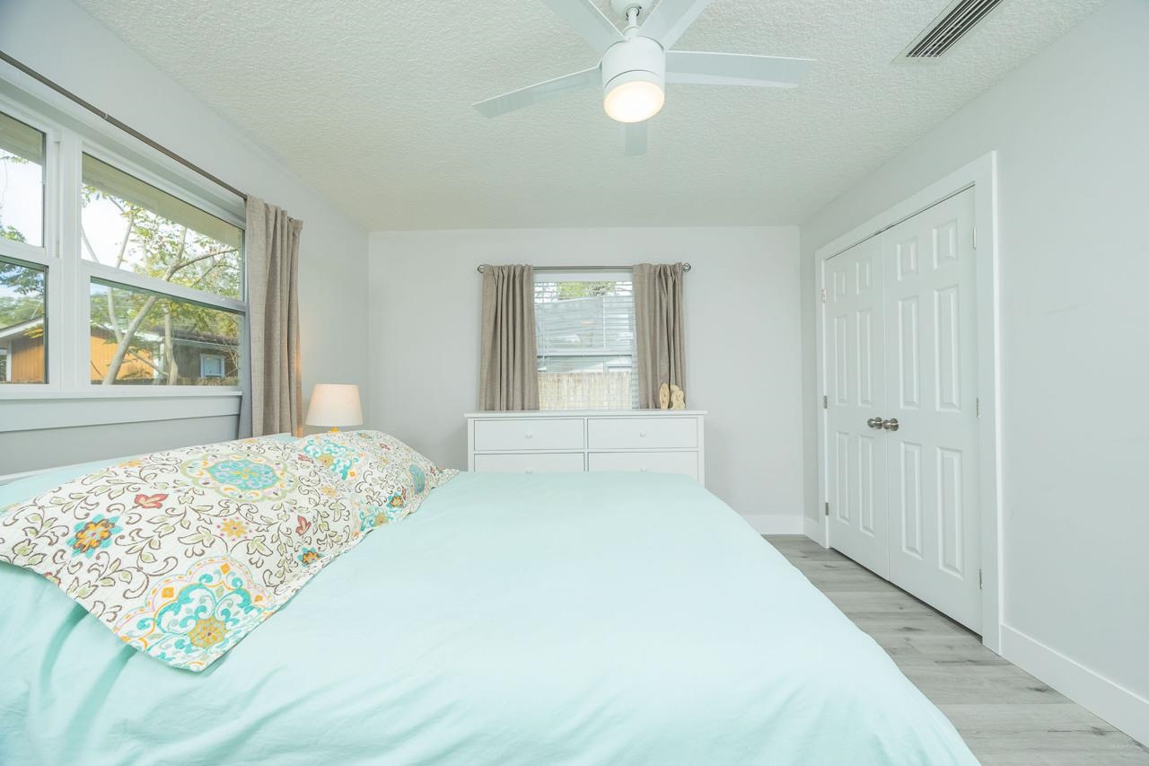 110 Queen Road St. Augustine, FL 32086 - Photo 26 of 37 a bedroom with a bed and a window